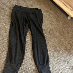Charcoal, gray Adidas joggers, sweatpants